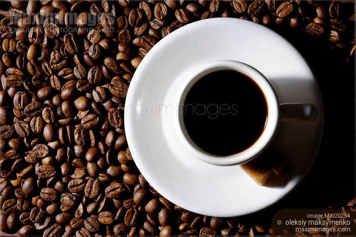 Stock photo of Cup of Black Coffee on Coffee Beans Buy commercial use license at MaximImages