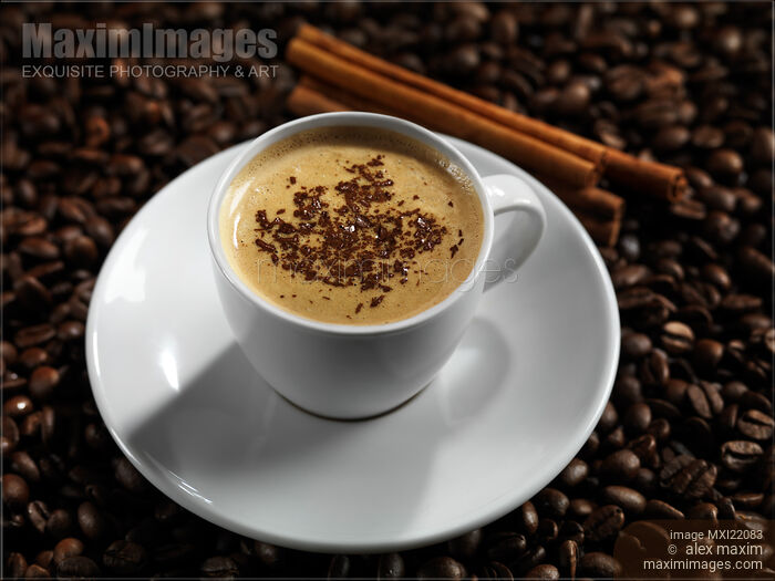 Cup of Coffe Latte on Coffee Beans Stock photo of Cup of Coffe Latte on Coffee Beans Buy commercial use license at MaximImages