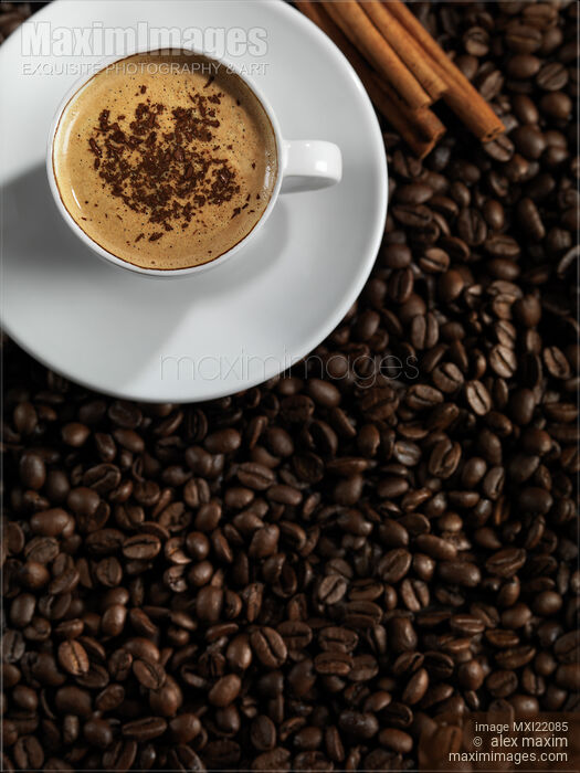 Cup of Coffe Latte on Coffee Beans Stock photo of Cup of Coffe Latte on Coffee Beans Buy commercial use license at MaximImages