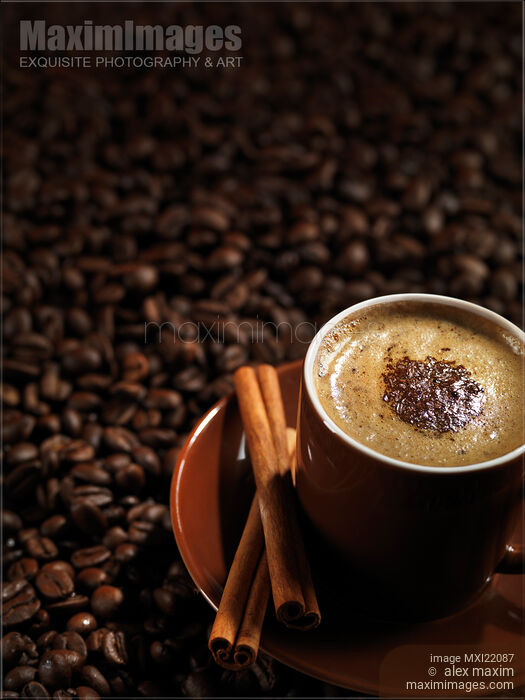 Cup of Coffe Latte on Coffee Beans Stock photo of Cup of Coffe Latte on Coffee Beans Buy commercial use license at MaximImages