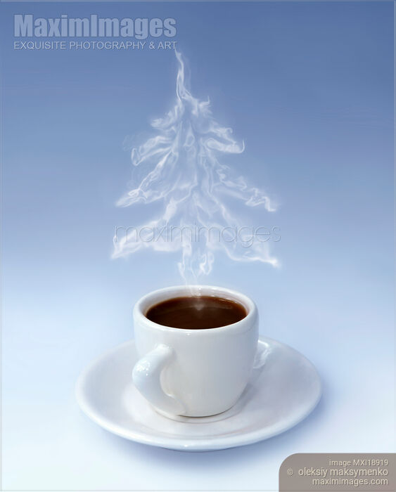Stock photo of Cup of coffee with Christmas tree steam Buy commercial use license at MaximImages