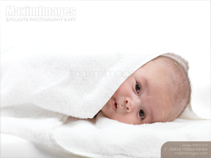 Stock photo of Cute Baby Boy Wrapped in a Towel Buy commercial use license at MaximImages
