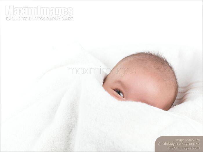Stock photo of Cute Baby Boy Wrapped in a Towel Buy commercial use license at MaximImages