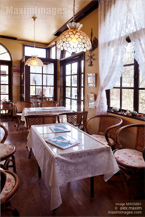 Cute cafe interior Stock photo of Cute cafe interior Buy commercial use license at MaximImages