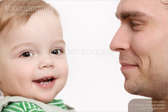 Stock photo of Cute little boy with his father Buy commercial use license at MaximImages