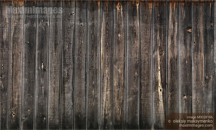 Stock photo of Dark gray wooden boards wall texture Buy commercial use license at MaximImages