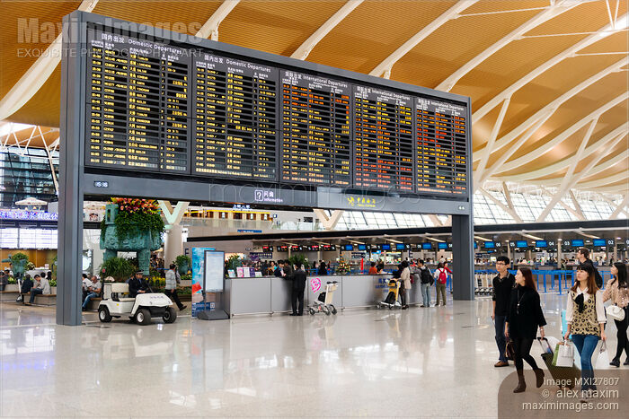 Stock photo of Departure board at Shanghai Airport in China Buy commercial use license at MaximImages