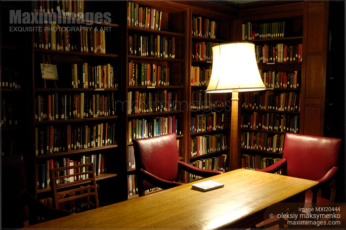 Stock photo of Dimly lit library Buy commercial use license at MaximImages