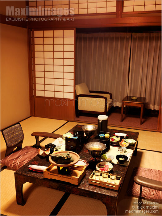 Stock photo of Dinner served on table at Japanese ryokan hotel room Buy commercial use license at MaximImages