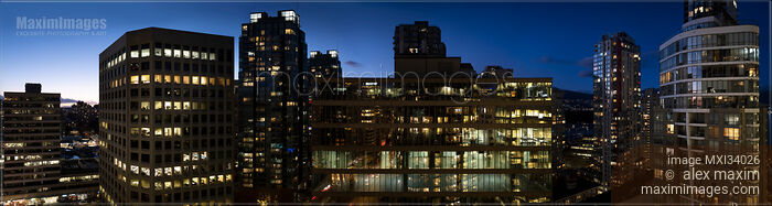 Stock photo of Downtown of Vancouver nighttime panoramic scenery of high-rise city office buildings and condo towers Buy commercial use license at MaximImages