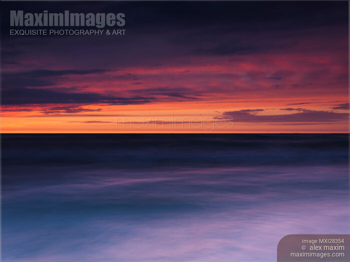 Dramatic abstract red and blue sunset scenery of lake Huron Stock photo of Dramatic abstract red and blue sunset scenery of lake Huron Buy commercial use license at MaximImages