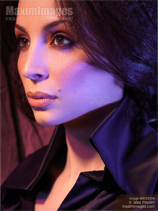 Stock photo of Dramatic closeup portrait of a beautiful woman Buy commercial use license at MaximImages