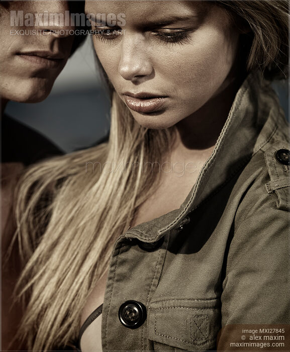 Stock photo of Dramatic closeup romantic portrait of a couple Black and white Buy commercial use license at MaximImages