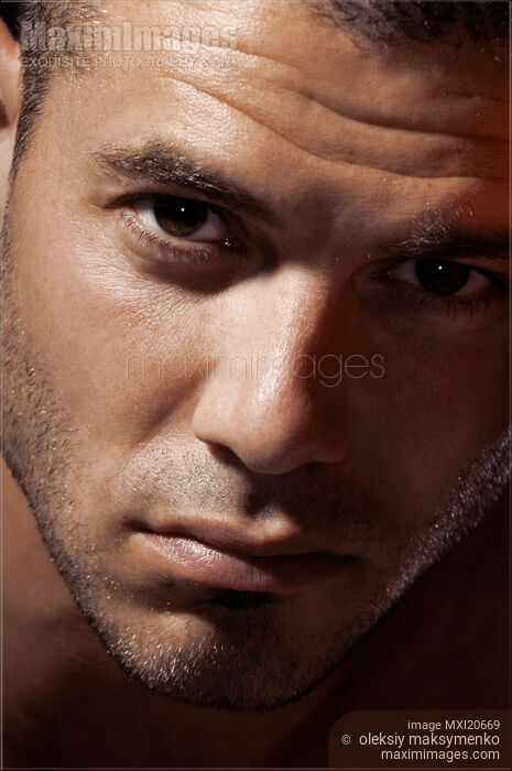 Stock photo of Dramatic Male Portrait Buy commercial use license at MaximImages
