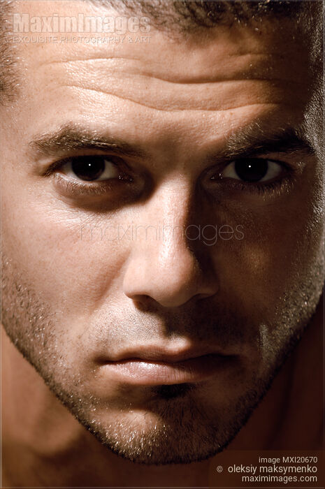 Stock photo of Dramatic Male Portrait Buy commercial use license at MaximImages