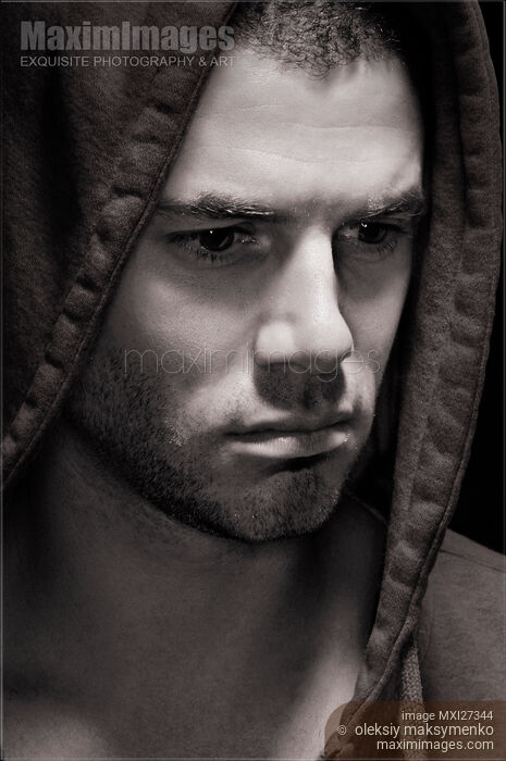 Stock photo of Dramatic Male Portrait Buy commercial use license at MaximImages