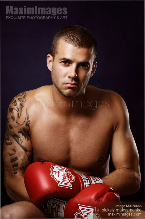 Stock photo of Dramatic Portrait of a Kickboxer Buy commercial use license at MaximImages