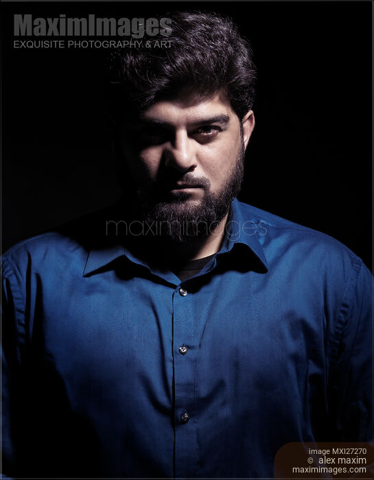 Stock photo of Dramatic portrait of a middle eastern man Buy commercial use license at MaximImages