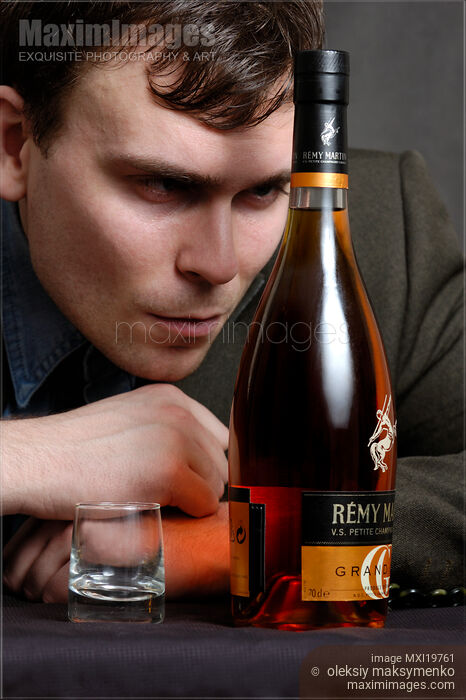 Drinking Young Man Stock photo of Drinking Young Man Buy commercial use license at MaximImages