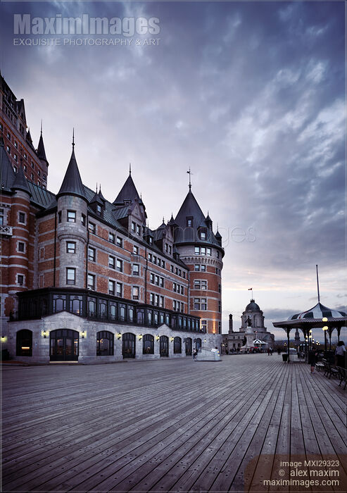 Dufferin terrace at Fairmont Le Chateau Frontenac grand hotel in Quebec city with dramatic skies Stock photo of Dufferin terrace at Fairmont Le Chateau Frontenac grand hotel in Quebec city with dramatic skies Buy commercial use license at MaximImages