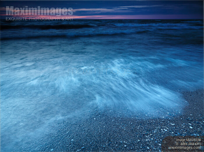 Stock photo of Dusk nature scenery of waves on the shore of lake Huron Buy commercial use license at MaximImages