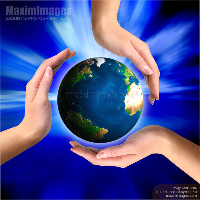 Stock photo of Earth globe in hands Buy commercial use license at MaximImages