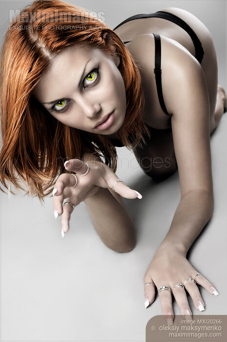 Edgy glamour portrait of sexy woman with cat eyes Stock photo of Edgy glamour portrait of sexy woman with cat eyes Buy commercial use license at MaximImages