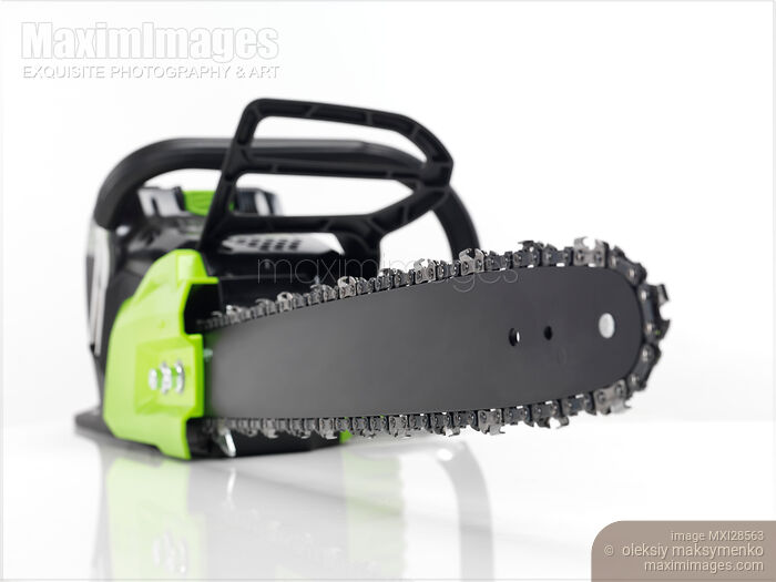 Stock photo of Electric Cordless Chainsaw on white Buy commercial use license at MaximImages