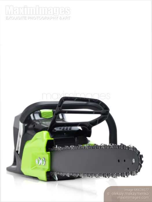 Electric Cordless Chainsaw on white background Stock photo of Electric Cordless Chainsaw on white background Buy commercial use license at MaximImages