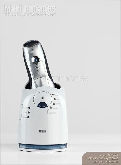 Stock photo of Electric Shaver with Self Cleaning System Buy commercial use license at MaximImages