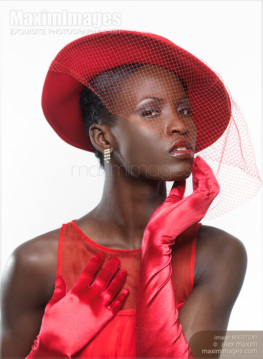 Stock photo of Elegant Woman in Red Buy commercial use license at MaximImages