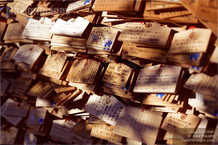 Stock photo of Ema wooden votive plates with written prayers and wishes at Shinto shrine in Japan Buy commercial use license at MaximImages