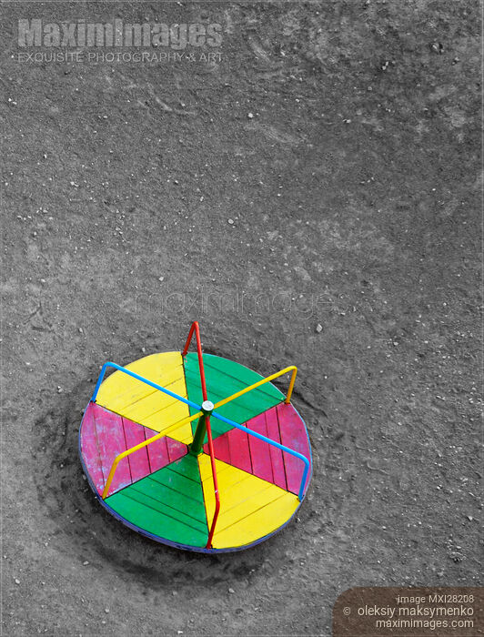 Stock photo of Empty Roundabout at Playground Buy commercial use license at MaximImages