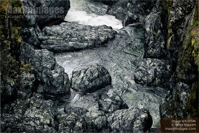 Englishman River glossy rocky banks Dramatic nature scenery at Vancouver Island Stock photo of Englishman River glossy rocky banks Dramatic nature scenery at Vancouver Island Buy commercial use license at MaximImages