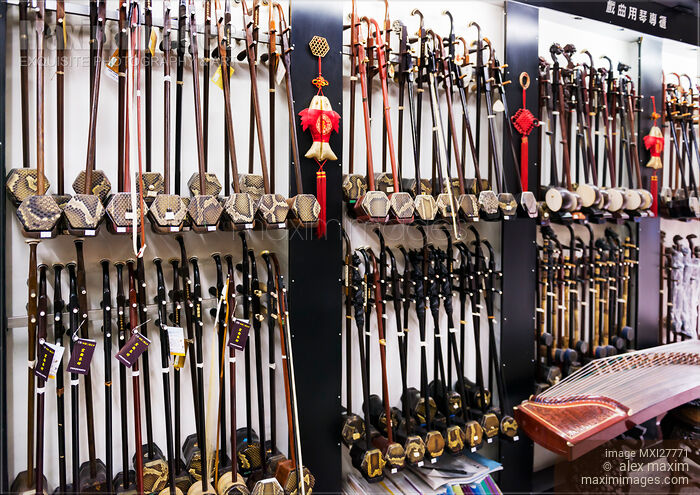 Stock photo of Erhu instruments in a store Buy commercial use license at MaximImages
