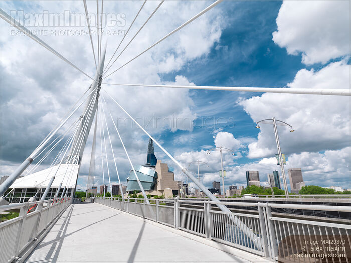 Stock photo of Esplanade Riel Footbridge and downtown skyline of Winnipeg Manitoba Buy commercial use license at MaximImages