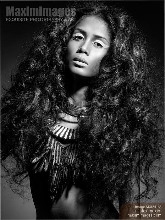 Ethnic beauty portrait of a young woman black and white Stock photo of Ethnic beauty portrait of a young woman black and white Buy commercial use license at MaximImages