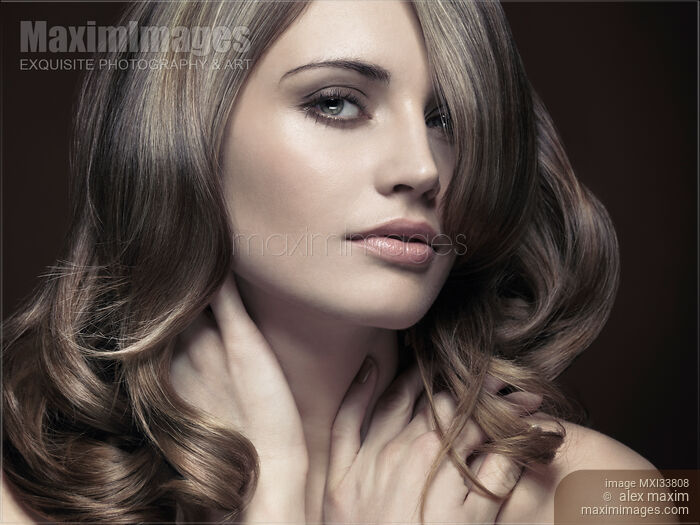 Stock photo of Expressive beauty portrait of woman face with gray eyes and light brown platinum hair with bangs Buy commercial use license at MaximImages