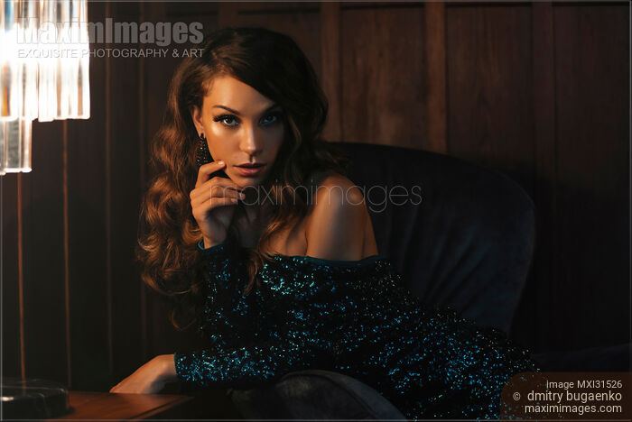 Expressive portrait of a woman with a questioning sensual look Stock photo of Expressive portrait of a woman with a questioning sensual look Buy commercial use license at MaximImages