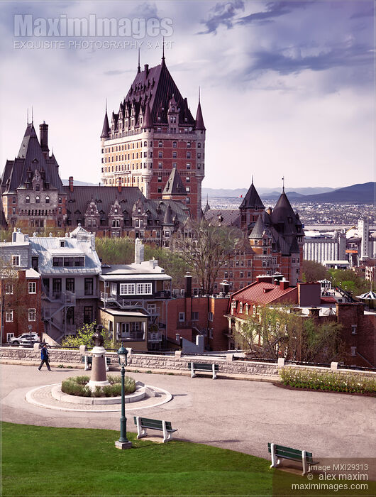 Stock photo of Fairmont Le Chateau Frontenac in Quebec city Canada under dramatic sky in daytime Buy commercial use license at MaximImages