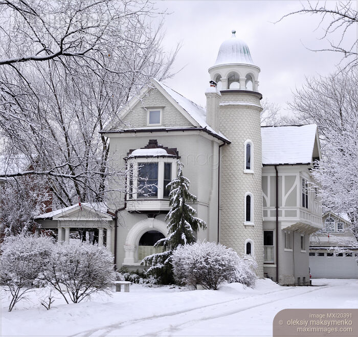 Stock photo of Family House Covered with Snow Buy commercial use license at MaximImages