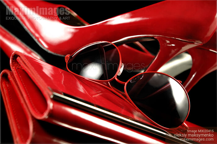 Fashion Accessories Red Handbag Shoes Sunglasses Stock photo of Fashion Accessories Red Handbag Shoes Sunglasses Buy commercial use license at MaximImages