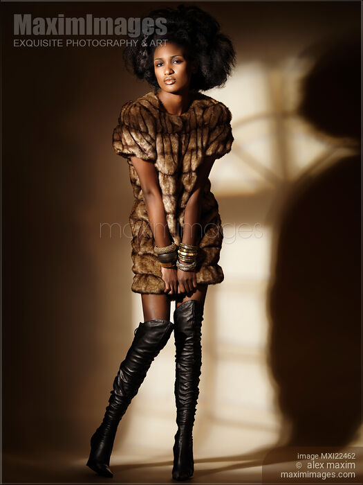 Stock photo of Fashion Model Wearing a Fur Coat Buy commercial use license at MaximImages