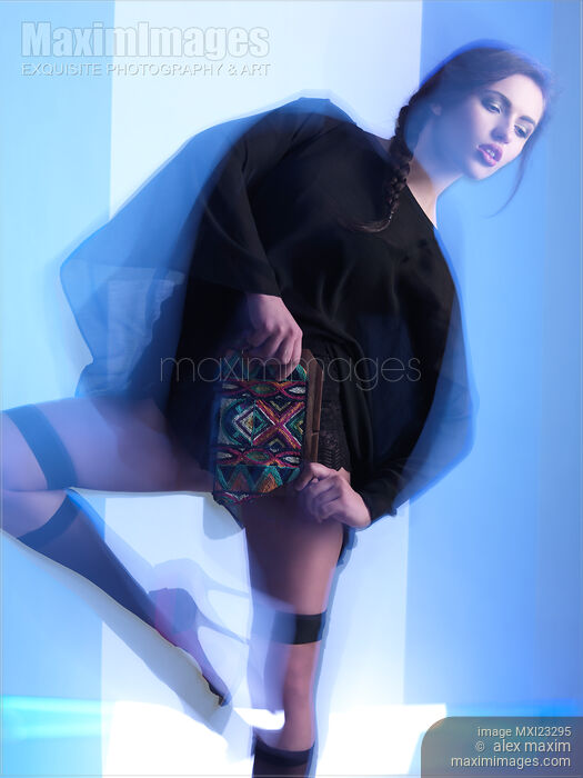 Stock photo of Fashion Photo of a Woman in Shining Blue Settings Buy commercial use license at MaximImages