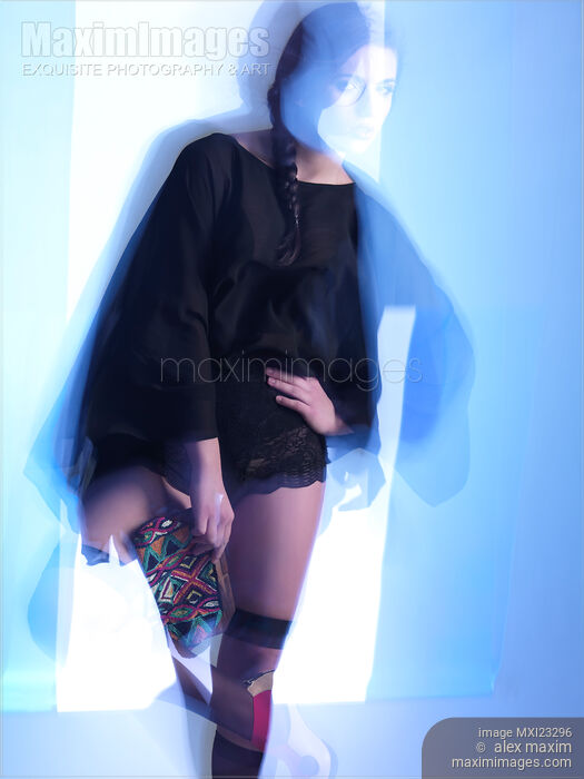 Stock photo of Fashion Photo of a Woman in Shining Blue Settings Buy commercial use license at MaximImages