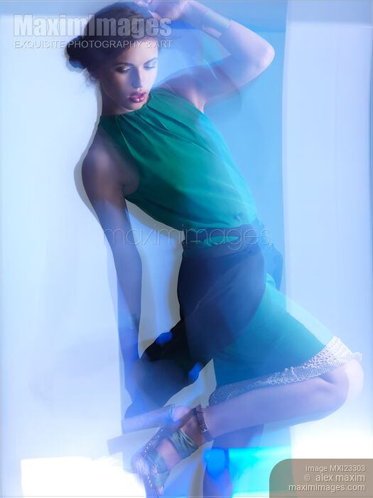 Fashion Photo of a Woman in Shining Blue Settings Stock photo of Fashion Photo of a Woman in Shining Blue Settings Buy commercial use license at MaximImages