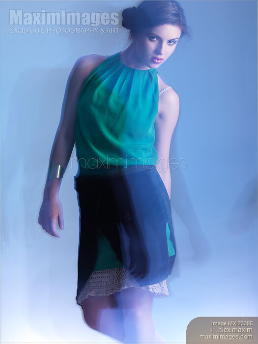 Stock photo of Fashion Photo of a Woman in Shining Blue Settings Buy commercial use license at MaximImages
