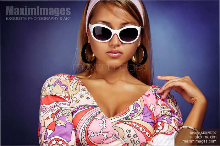 Fashionable young woman portrait Stock photo of Fashionable young woman portrait Buy commercial use license at MaximImages