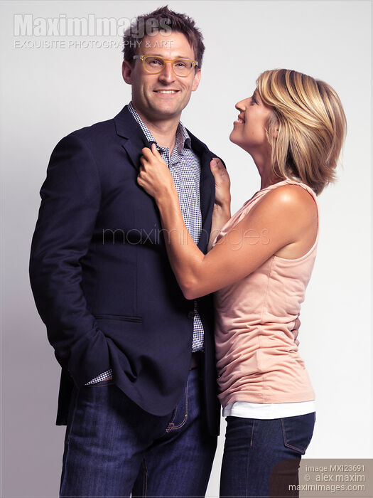 Fashionably Dressed Couple Stock photo of Fashionably Dressed Couple Buy commercial use license at MaximImages