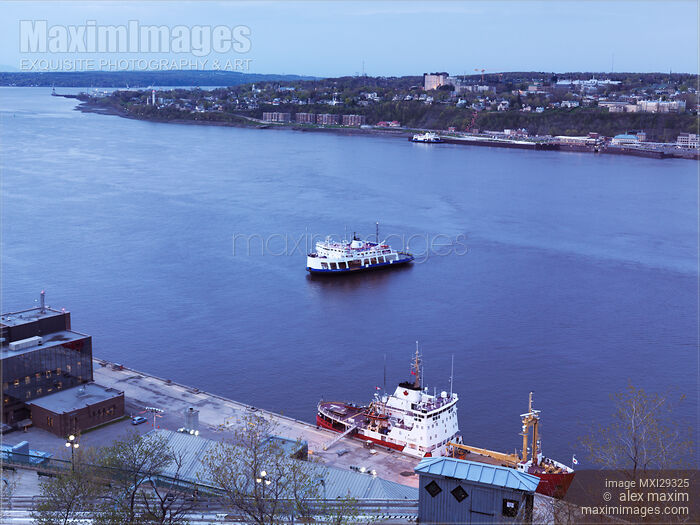Stock photo of Ferry over St Lawrence river in Quebec city Canada at dusk Buy commercial use license at MaximImages